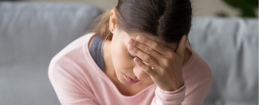 woman experiencing dizziness