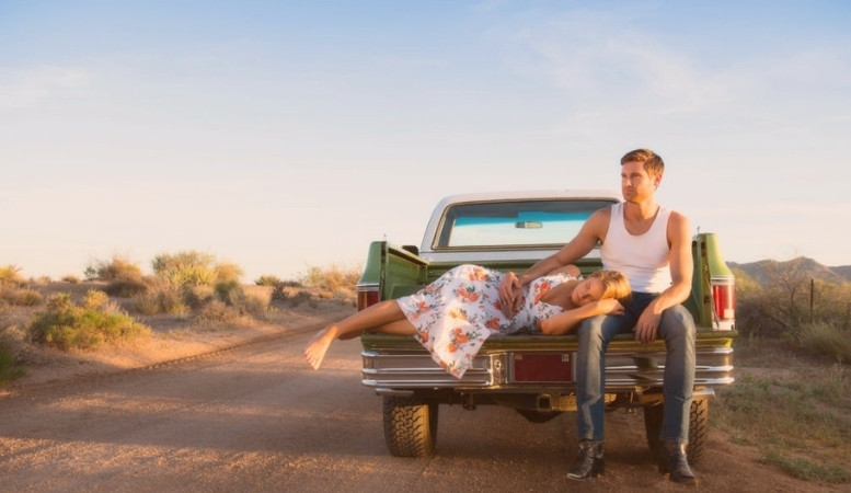 couples in the bed of a truck