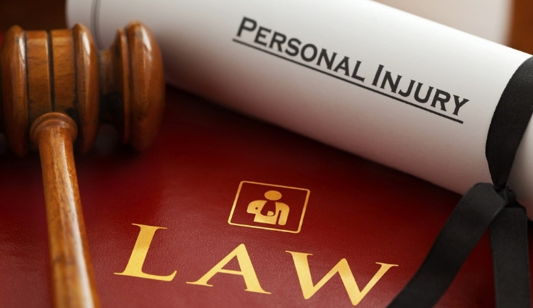 law book a gavel and a personal injury claim