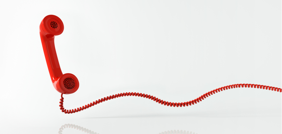 a hanging red telephone