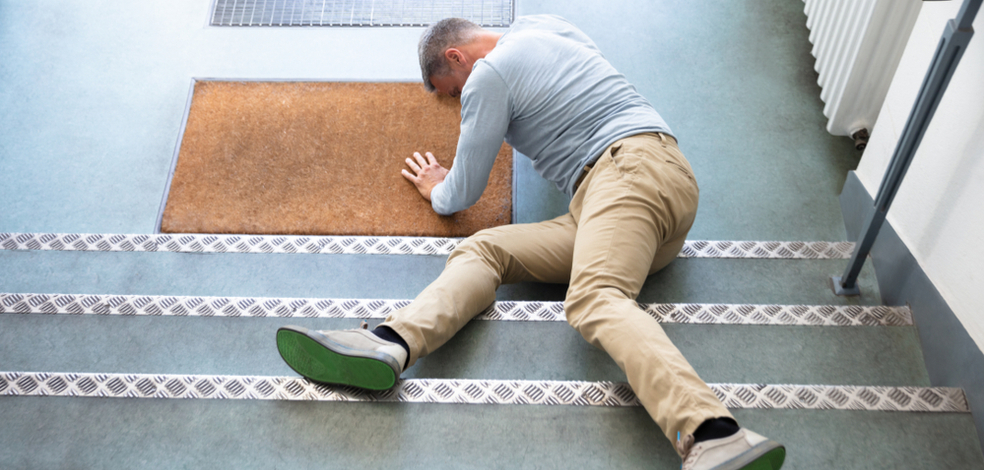 a man falling down the stairs