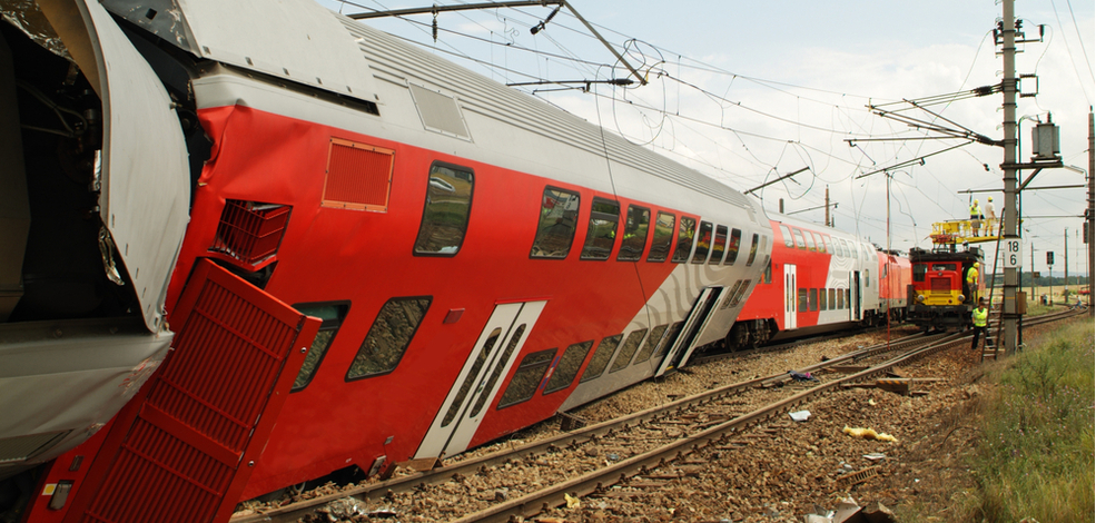 derailed and damaged red train