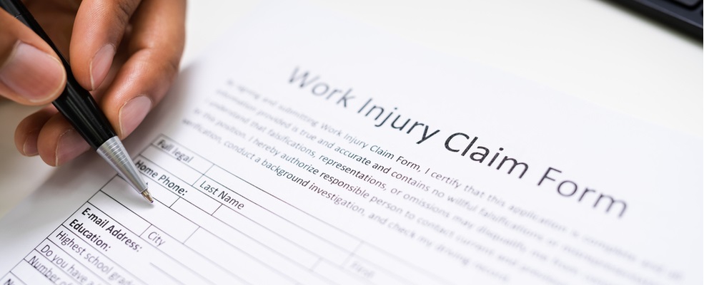 hand writing in a work injury claim form