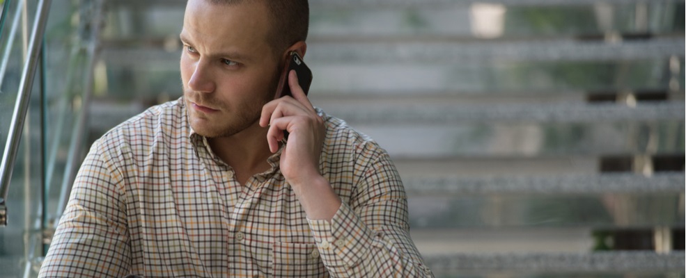 man calling his attorney after a motorcycle accident