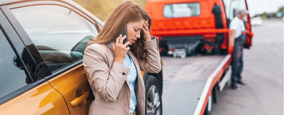 woman calling her attorney after a truck accident