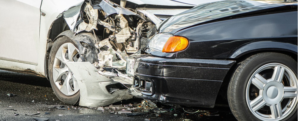 head on collision between two cars