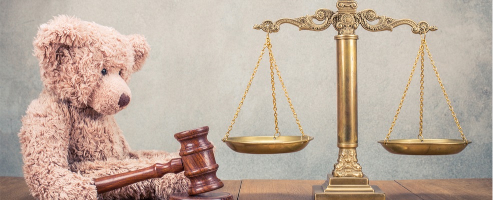 teddy bear a gavel and the justice scale