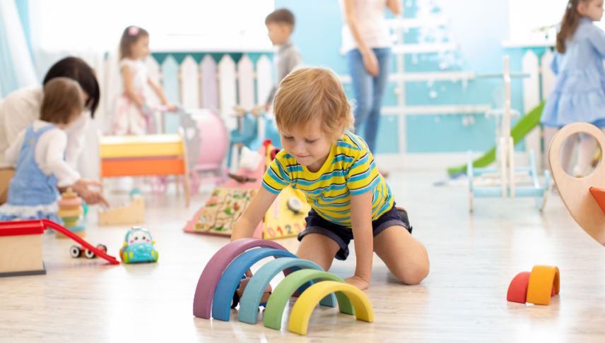 kids playing on floor at daycare