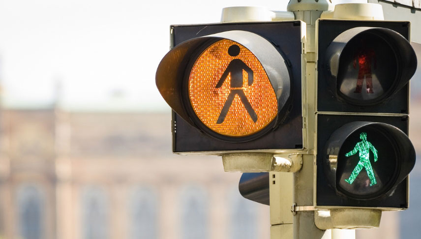 pedestrian lights with green red and yellow lights