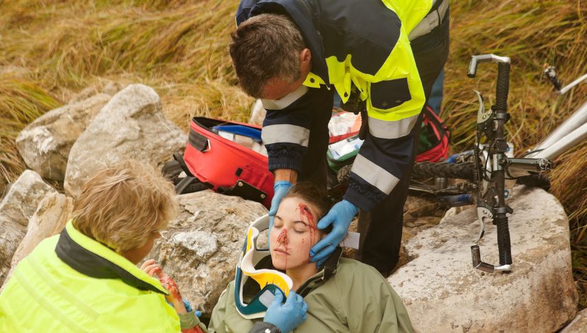 emergency response team helping injured woman