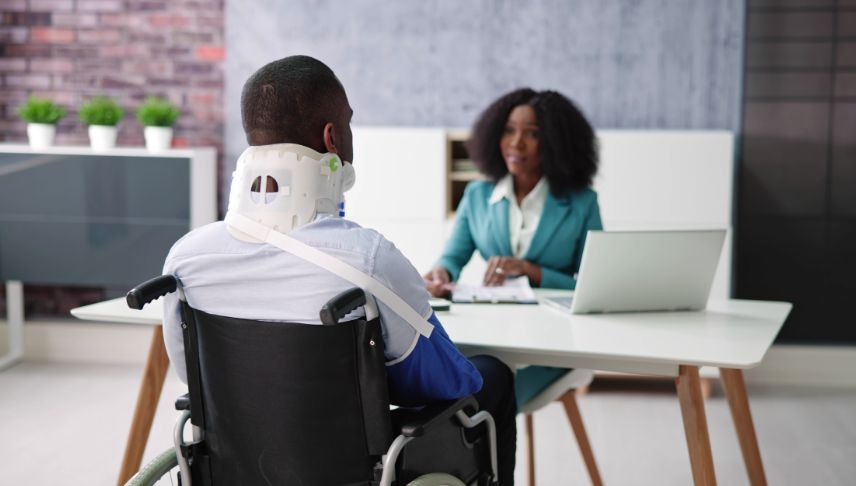 man filling temporary disability insurance claim