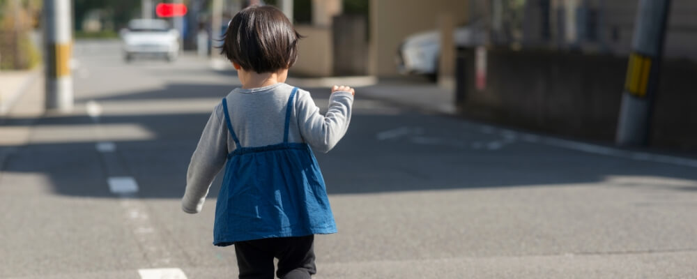 child walking in the highway