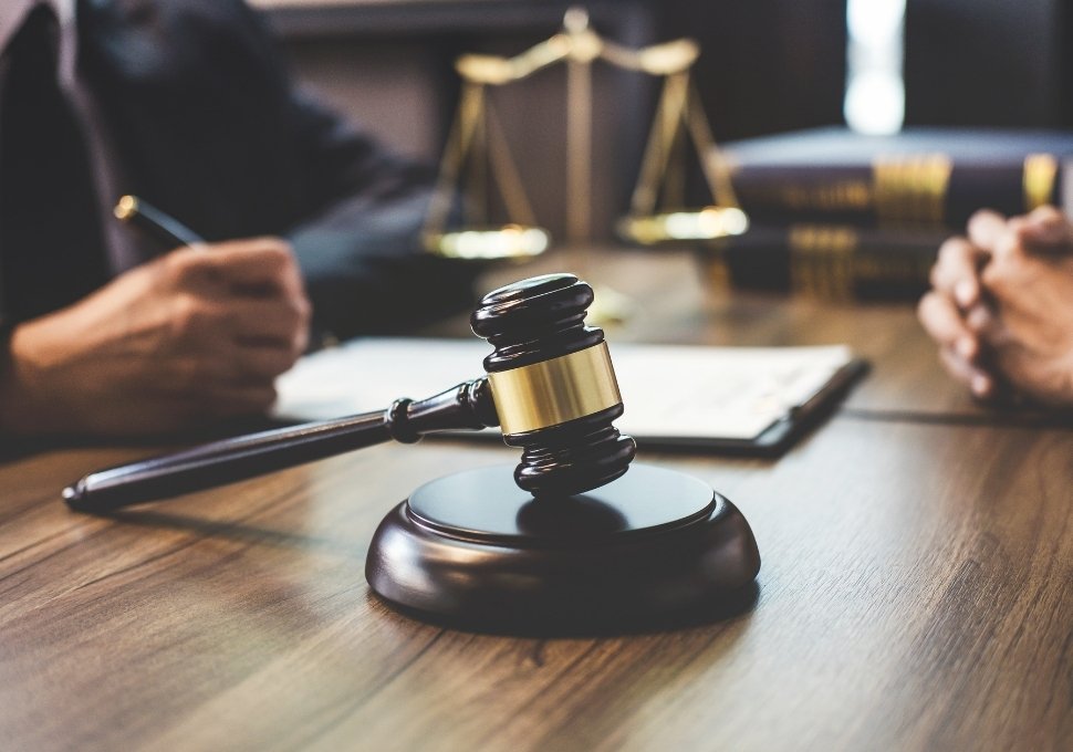 man discussing a car accident to an attorney