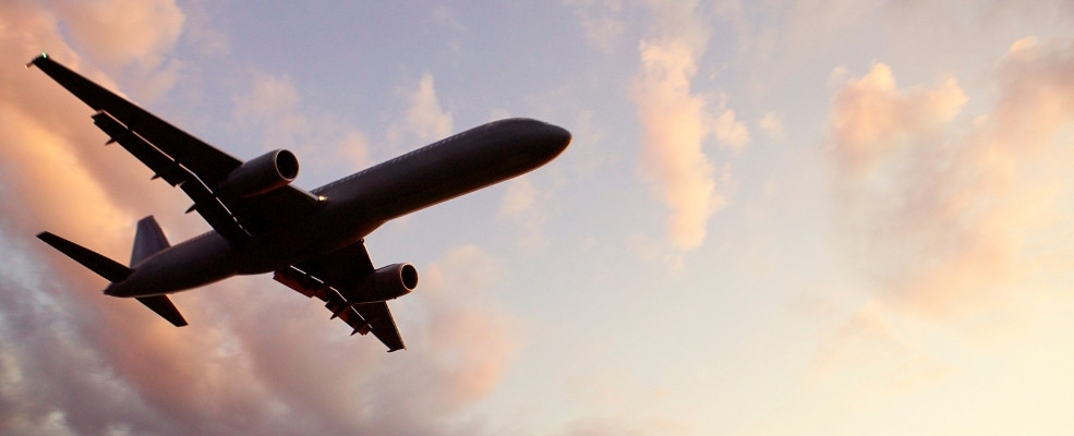 airplane flying in the afternoon