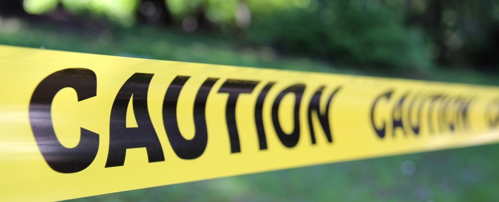 barrier tape with caution written into it