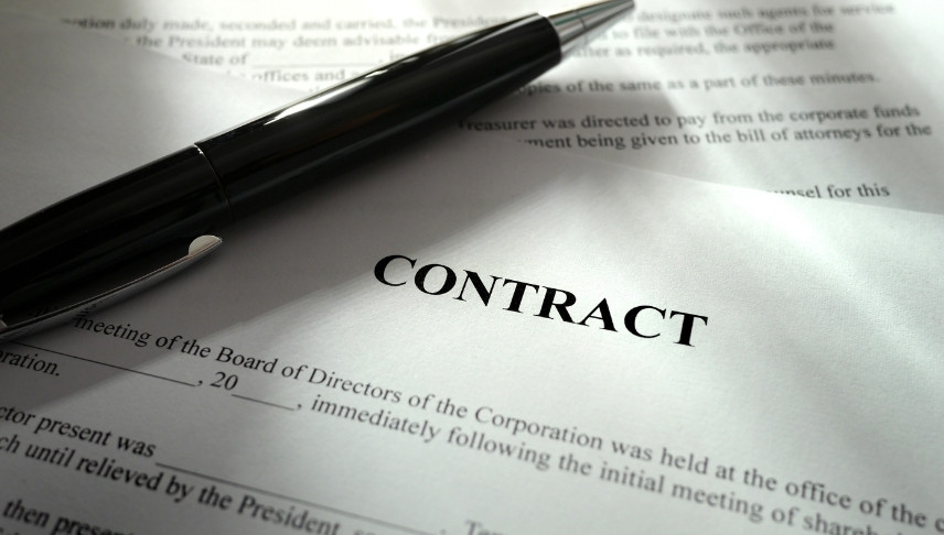 contract documents in a bottom of a pen